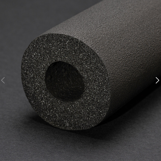 Black foam roller on a dark gray background